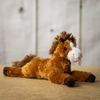 A laying brown horse that is 14 inches from head to tail