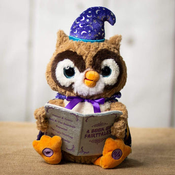 A animated brown owl that is 12 inches tall while sitting dressed as a wizard holding a storybook