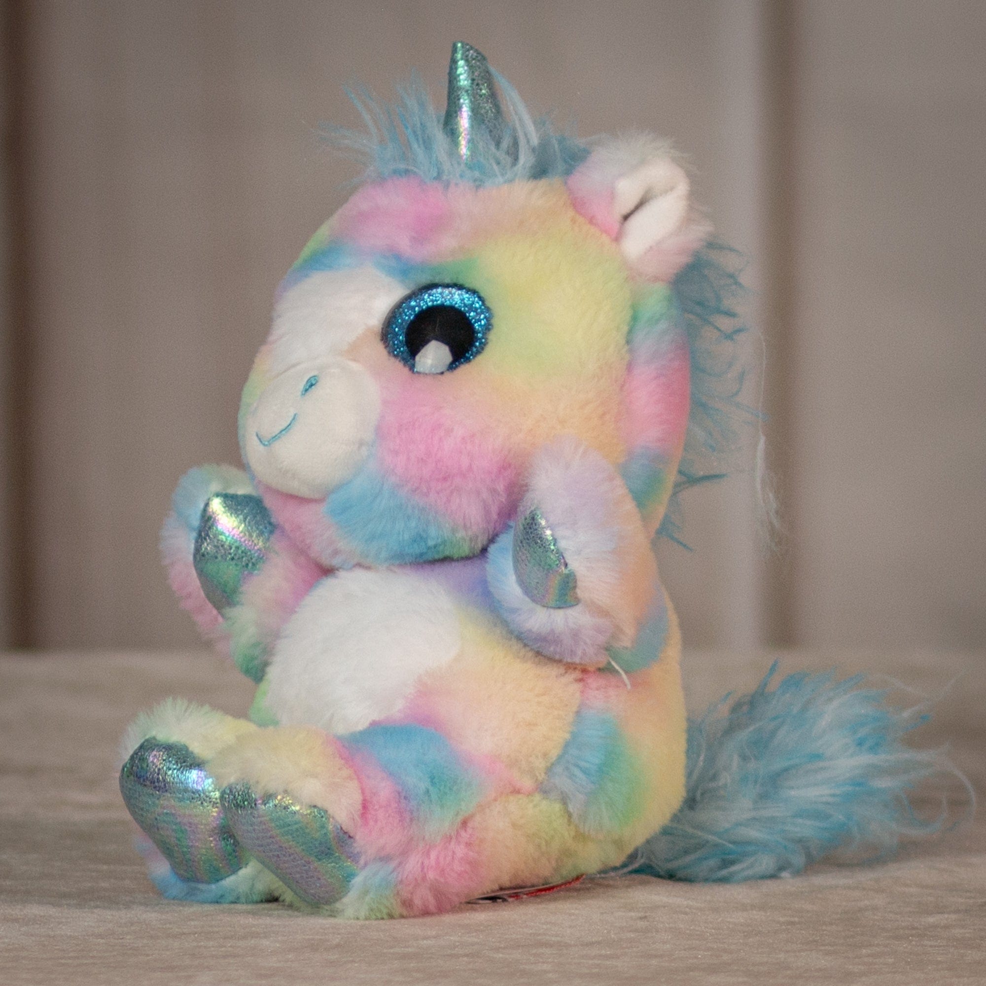 6.5" rainbow Dazzle Unicorn with sparkle eyes and iridescent horn and hands and feet 