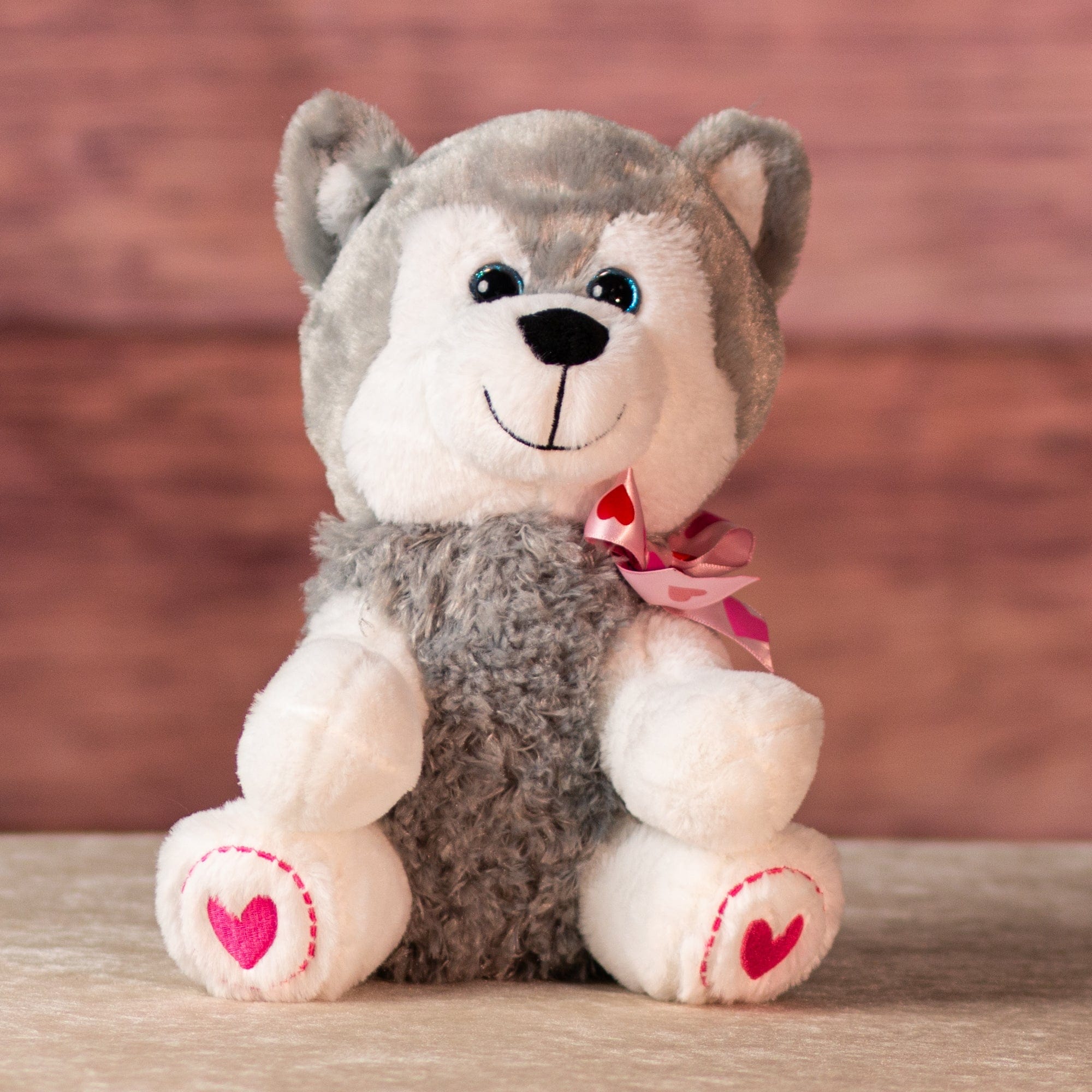 stuffed 10 in husky wearing bows and heart paws