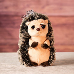 10 inch stuffed hedgehog with eyelashes and a bow