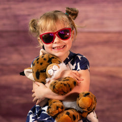 girl holding stuffed 12 in bobcat