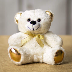 A white bear that is 6 inches tall while sitting