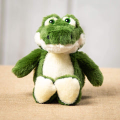 A green alligator that is 11 inches tall while standing