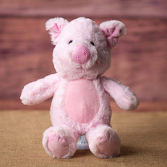 A pink pig that is 11 inches tall while standing