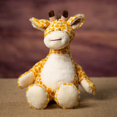 A giraffe that is 12 inches tall while standing in a sitting position