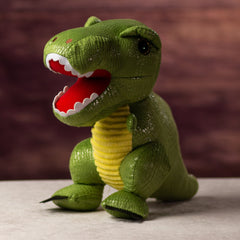 A green dinosaur that is 14 inches tall while standing