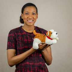 A woman holds a bulldog that's 9 inches from head to tail