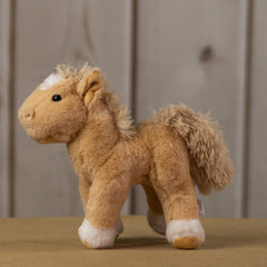 A beige horse that is 10.5 inches tall from head to tail