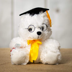 A white grad bear that is 10 inches tall while standing