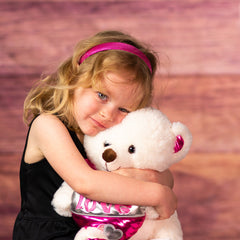 girl holding 14 in white big valentines bear with shiny love heart